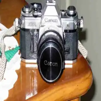 دوربین عکاسی CANON AE1بالنزنرمال50